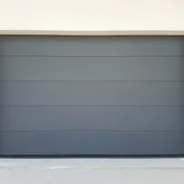 Portone sezionale Serrmetall monodoga finitura liscia grigio ral 7016