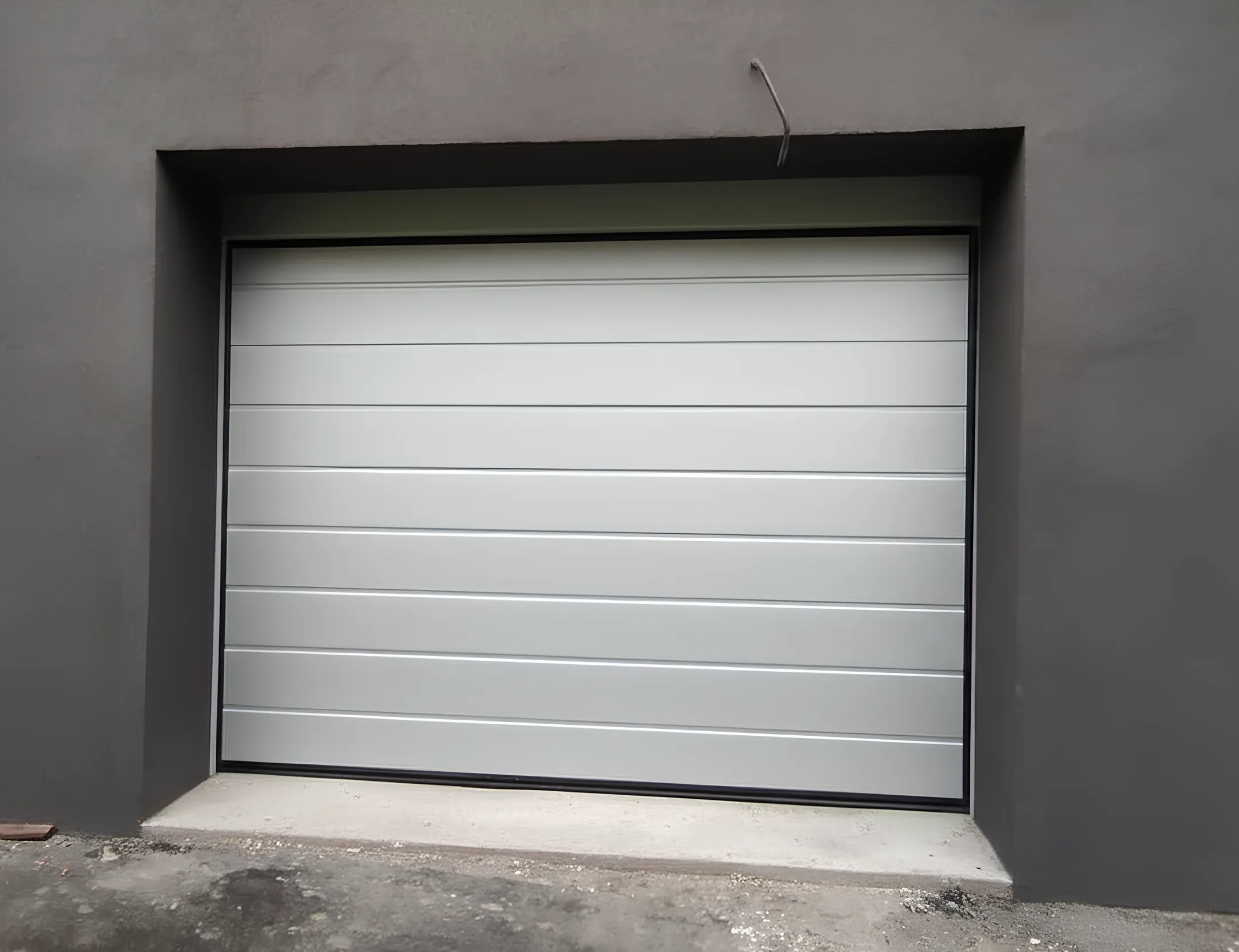 Porte sezionali bidoga finitura liscia