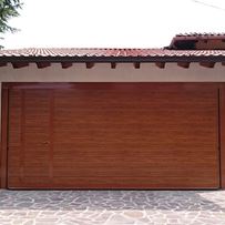 porta basculante in legno per garage a Nave